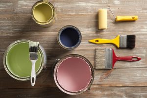 paint brushes and buckets