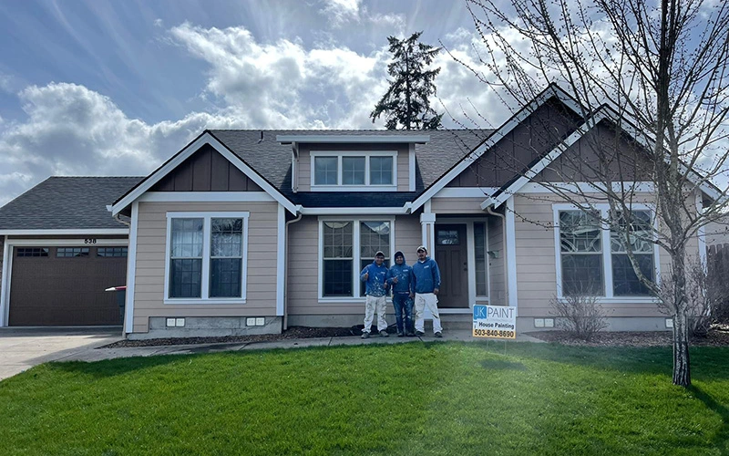 jk-paint-workers-posing-in-front-of-finished-painted-house