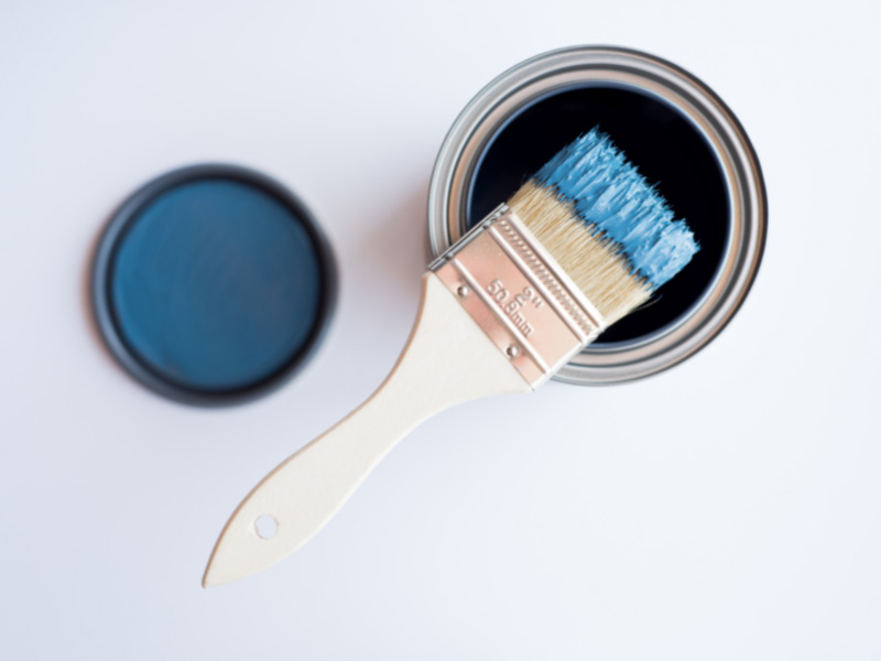 2-inch-bristle-paint-brush-dipped-in-blue-paint