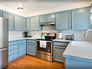 newly painted cabinets with blue paint | JK Cabinet Painting Services in Portland metro area newly painted cabinets with blue paint | JK Cabinet Painting Services in Portland metro area