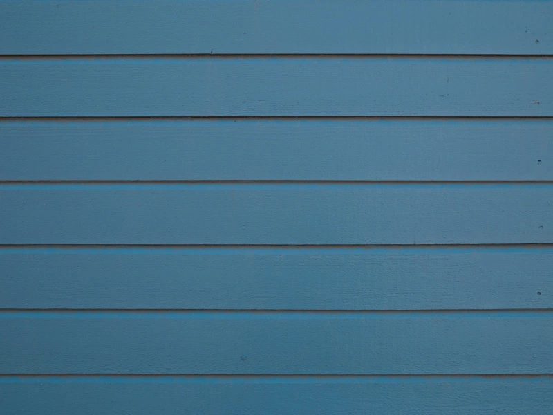 dark-teal-blue-painted-wooden-siding