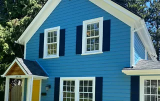 Blue house painted in portland by JK painting and contracting