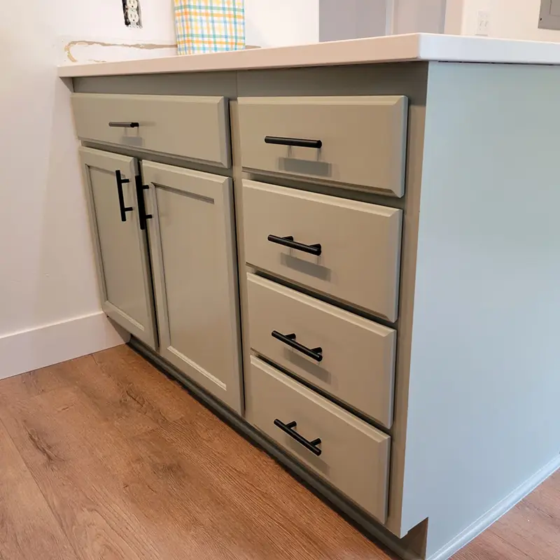 freshly-painted-green-cabinets