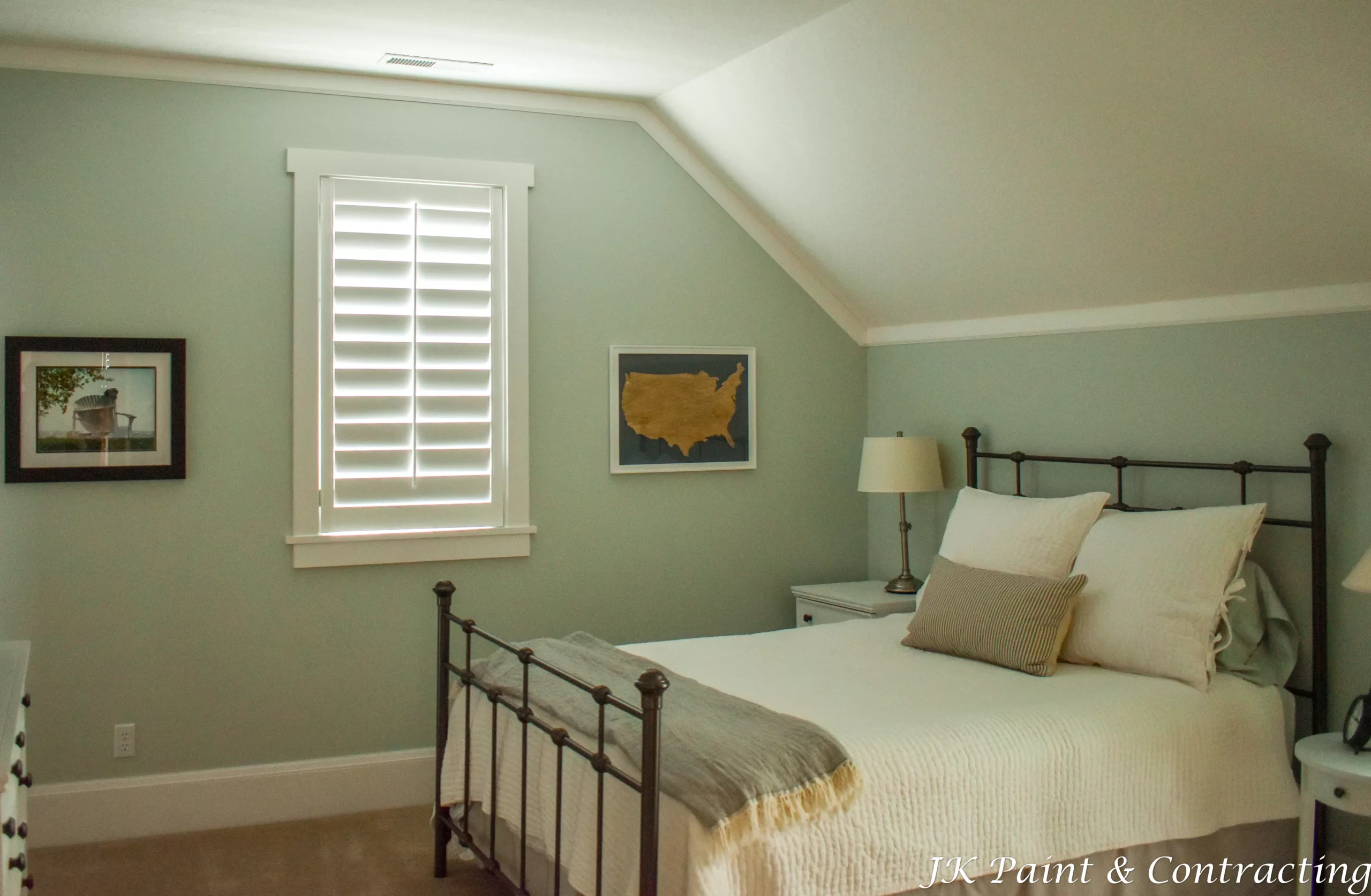 bedroom with light green interior and white