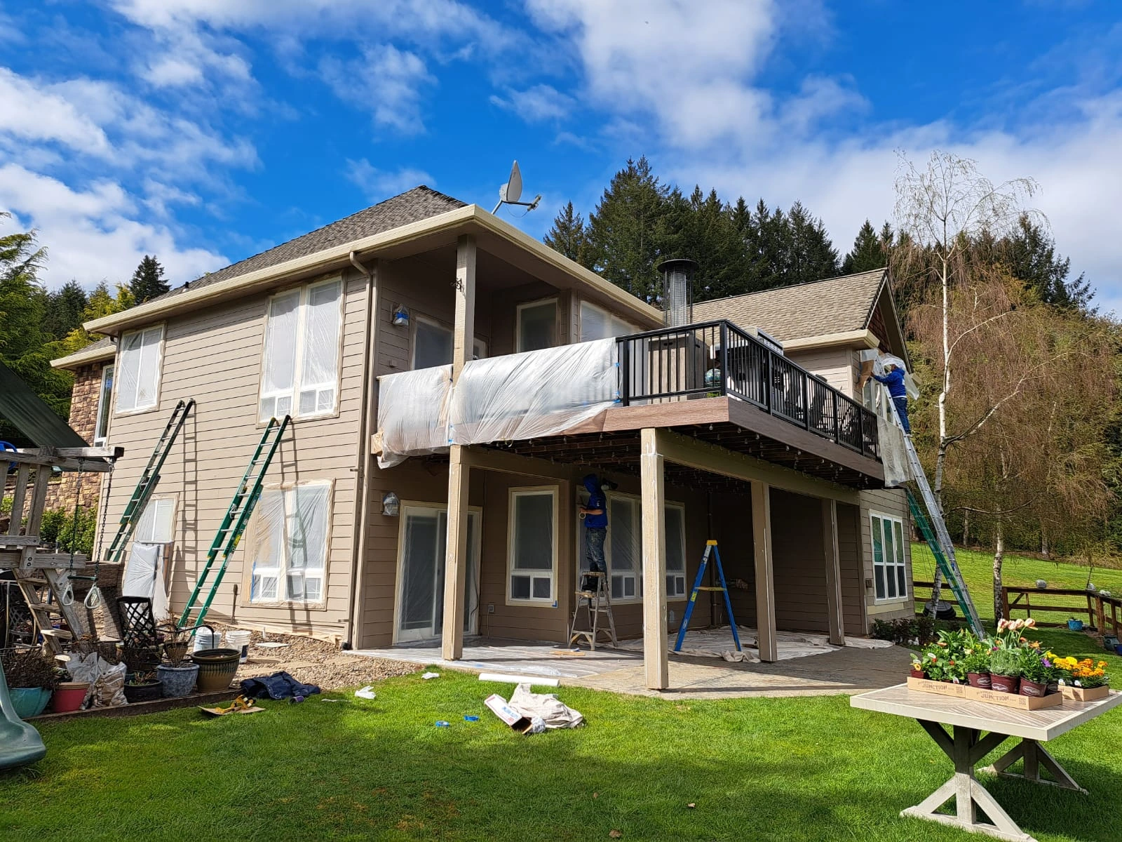 prepping to paint a home that is beige and other natural tones and accents with jk paint crew