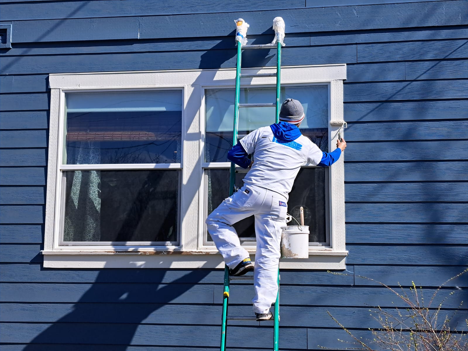 a portland painting contractor working on trim and mold painting