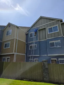 jk-paint-hoa-painting-portland-area-8 Multi-story residential building with tan and blue-gray siding