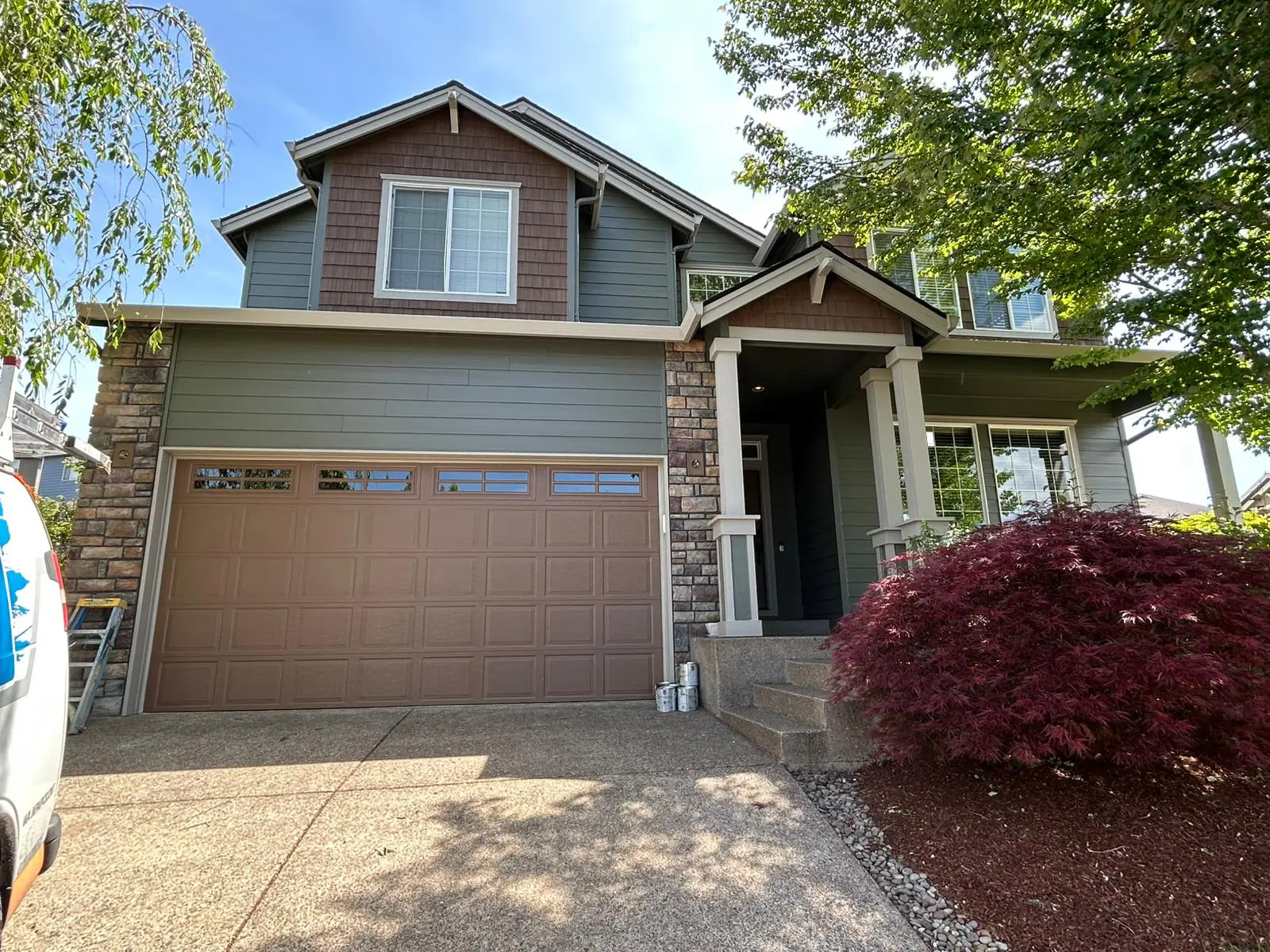 a portland home that was painted with a 2026 trending color, Thunderours by Sherwin Williams